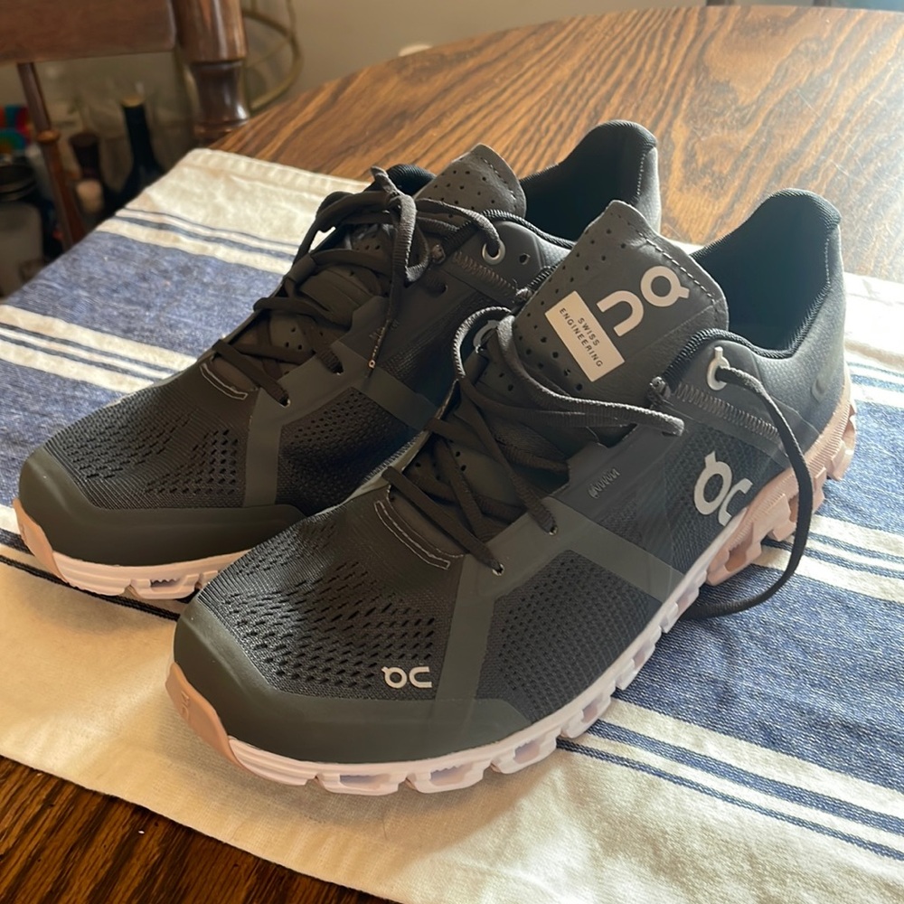 On Running Women's Athletic Shoes in Dark Gray with Light Pink Accents
